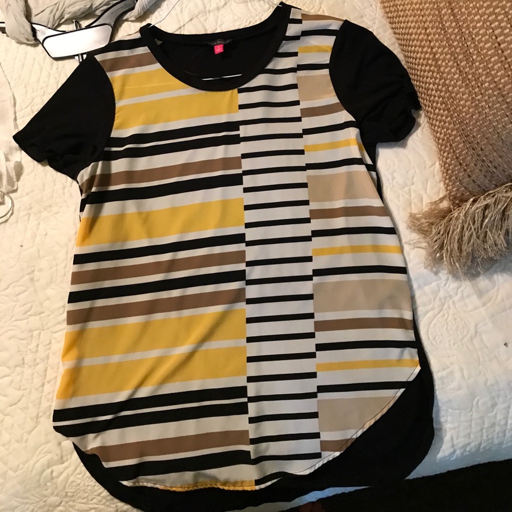 T-shirt style top. The back is solid black.